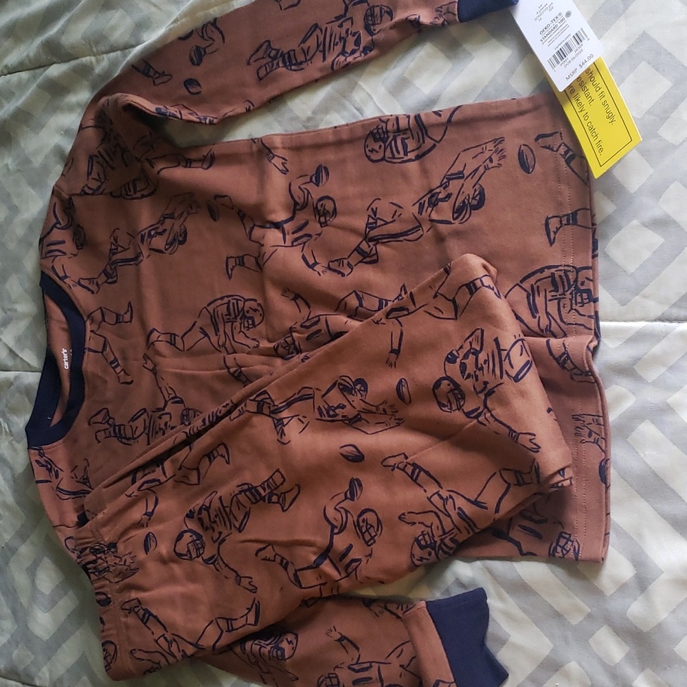 TWO Carters long-sleeved shirts and pants set pajamas. Boys size 14 youth.